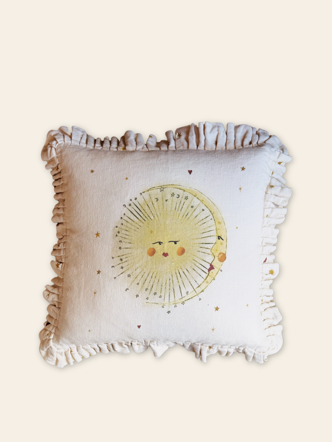 Ruffled Celestial linen cushion with sun, moon, stars and hearts