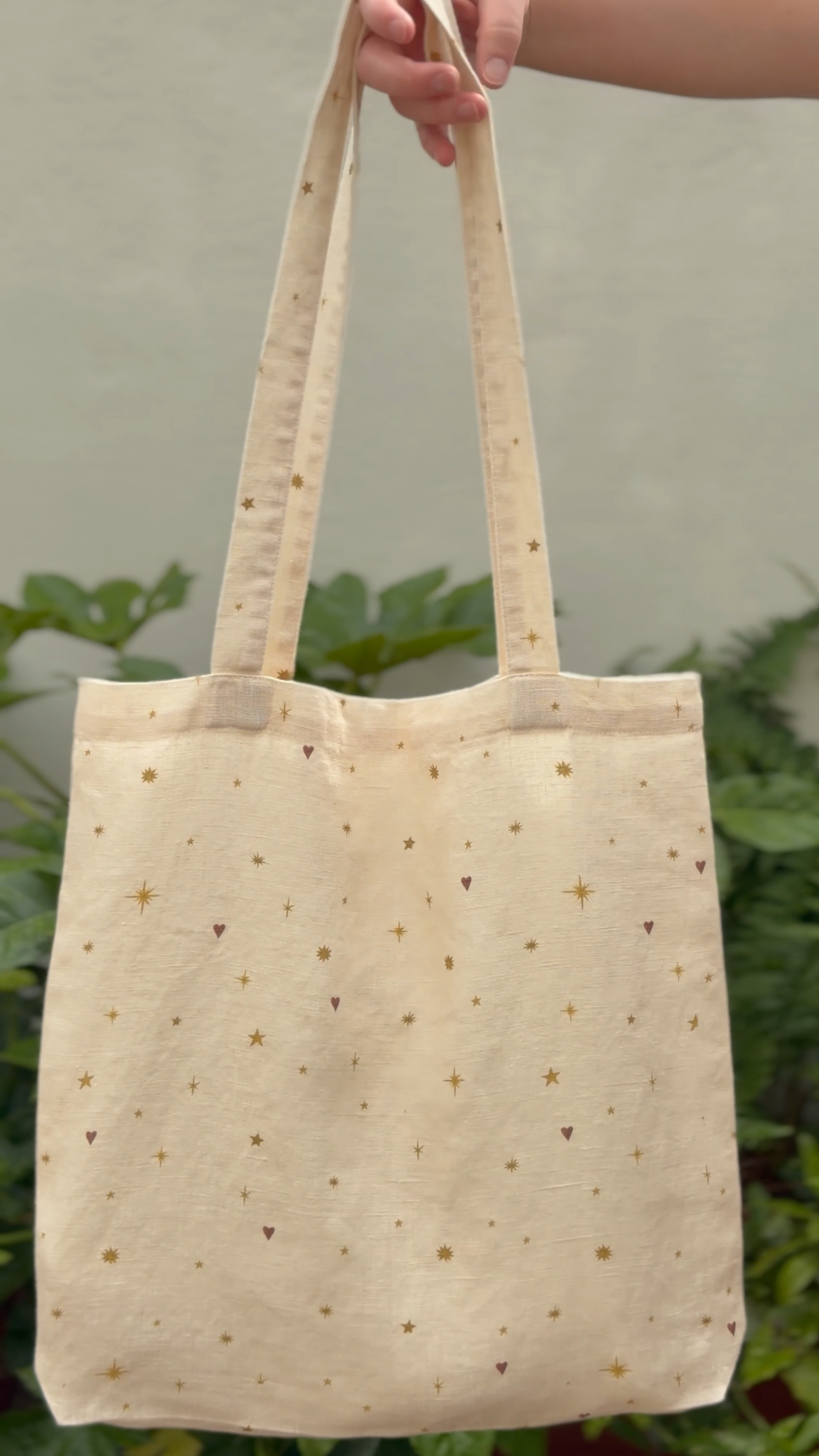 Pretty cream linen tote bag with stars and hearts scattered